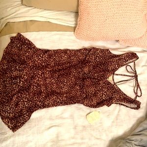 Fun cheetah dress with tie on back. V cut in front and back. Never worn